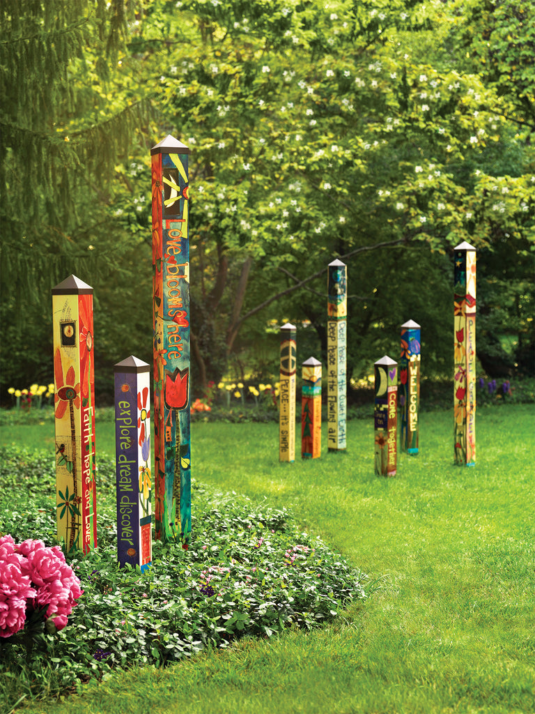 Painted Peace Art Poles with a heavier installation