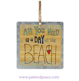 All You Need Is A Day At The Beach Tin Ornament